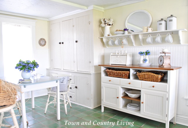 Town and Country Living kitchen with beadboard walls