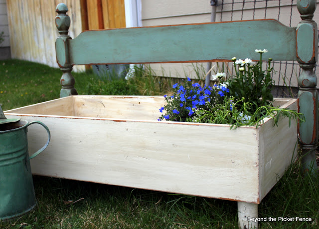Make a flower planter out of a headboard - part of the Farmhouse Friday roundup series at www.knickoftime.net