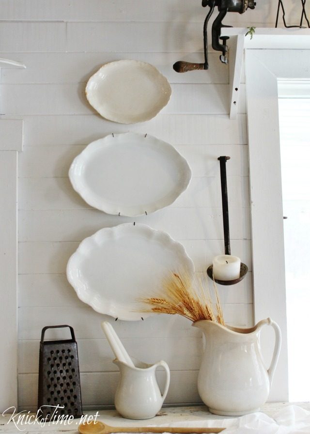 Gorgeous old platters make beautiful and simple winter white farmhouse wall decor - See more at https://knickoftime.net/