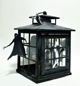 Create adorably cute spooky Halloween decor with a broken lantern featured at Talk of the Town at www.knickoftime.net