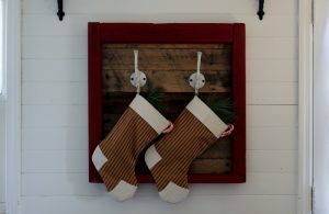 rustic farmhouse pallet wood and repurposed wooden window Christmas stockings hanger