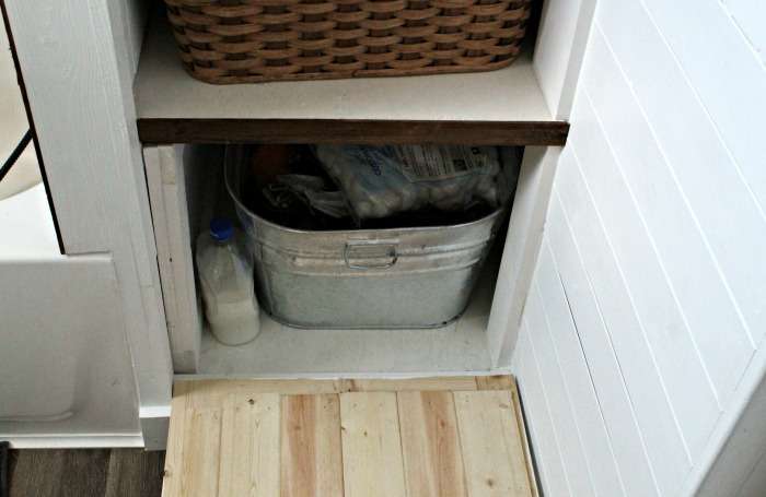 Farmhouse  Bathroom Open Shelves Cabinet with Barn Door Hidden Storage | #knickoftime #farmhouse | https://knickoftime.net #farhousebathroom #storage #barndoor 