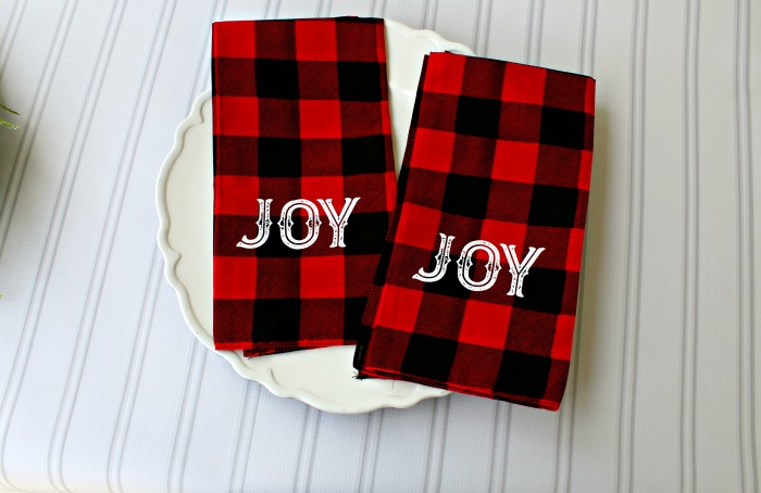 Easy DIY Red and Black Buffalo Check Cloth Bandana Napkins made with Chalk Couture Peace Joy Believe transfer set. Tutorial at Knick of Time | knickoftime.net